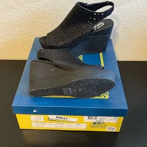 new in box. sbicca black zip up wedges. size 8.